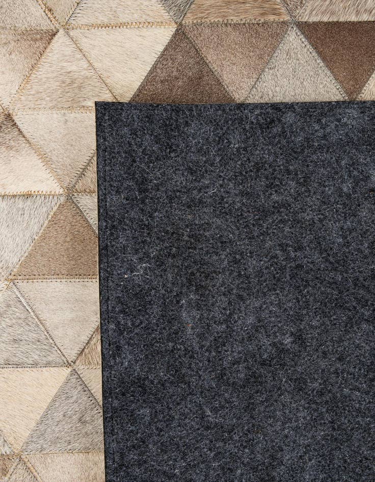 Detail image of 5' 1 x 7' 11 Cowhide - Patchwork Rug
