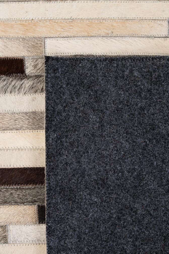 5' 3 x 8' Cowhide - Patchwork Rug