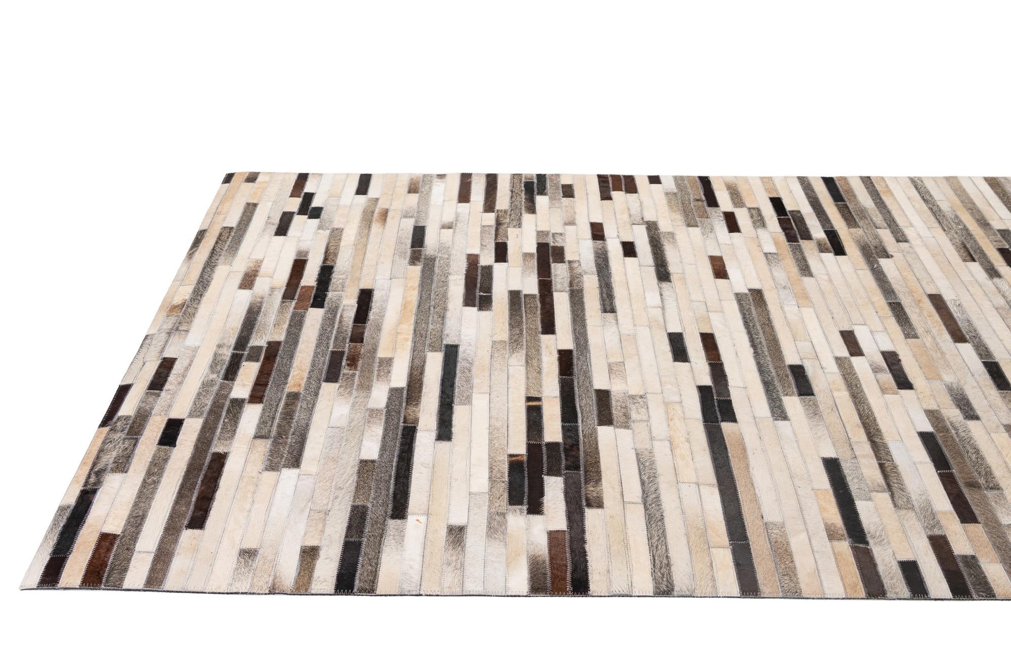 5' 1 x 7' 11 Cowhide - Patchwork Rug