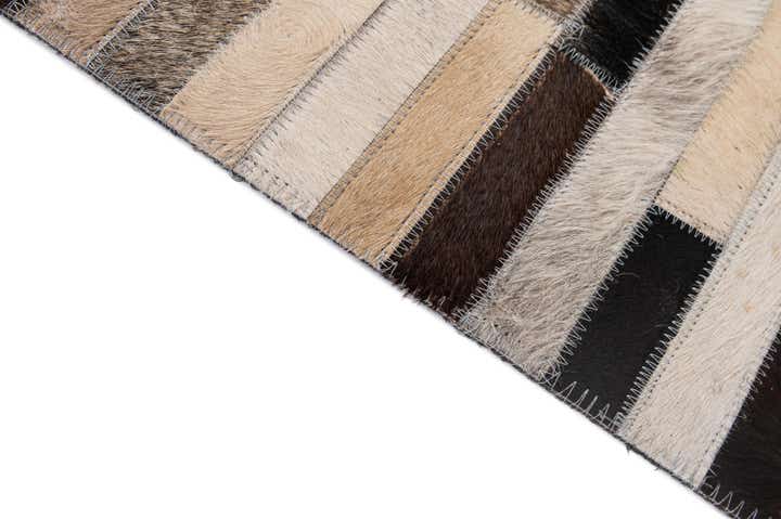 5' 1 x 7' 11 Cowhide - Patchwork Rug