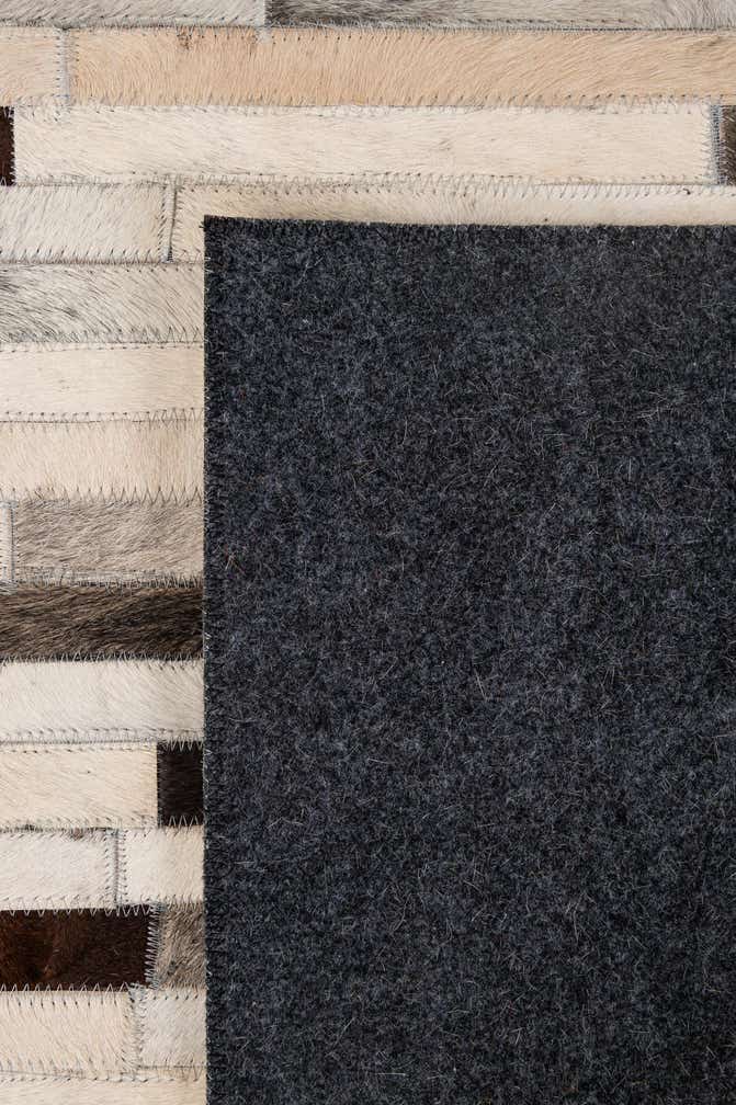 5' 1 x 7' 11 Cowhide - Patchwork Rug