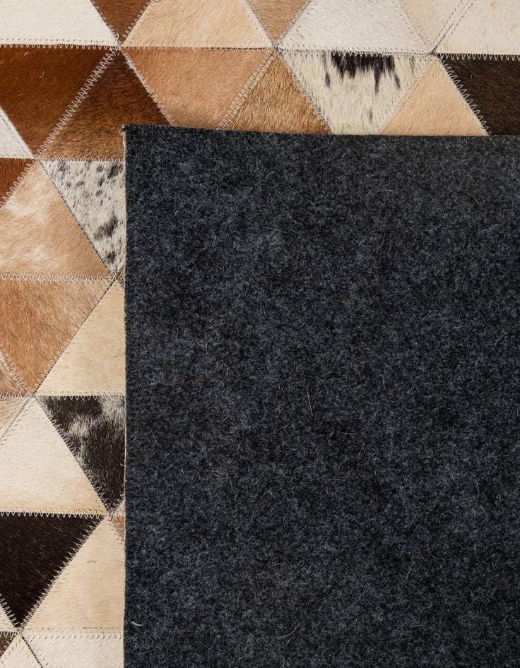 Detail image of 5' x 7' 11 Cowhide - Patchwork Rug