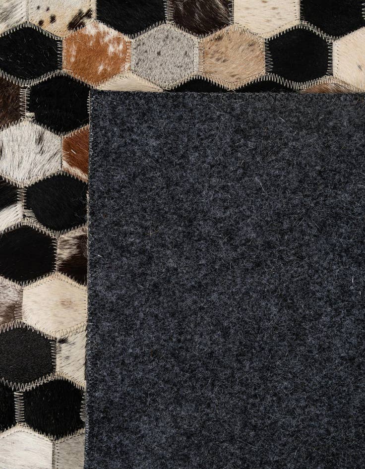 Detail image of 5' 1 x 7' 11 Cowhide - Patchwork Rug