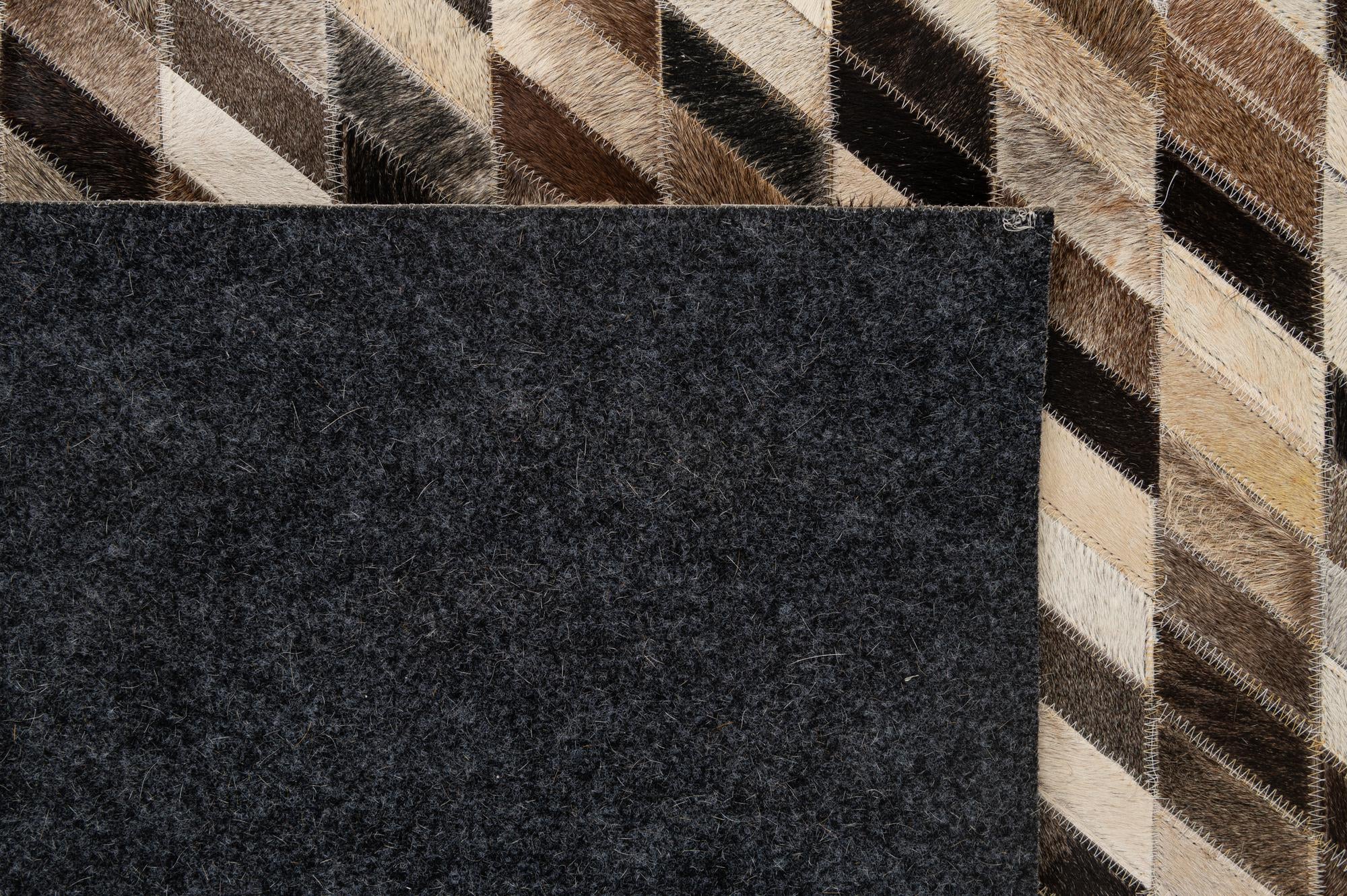 5' 1 x 7' 11 Cowhide - Patchwork Rug