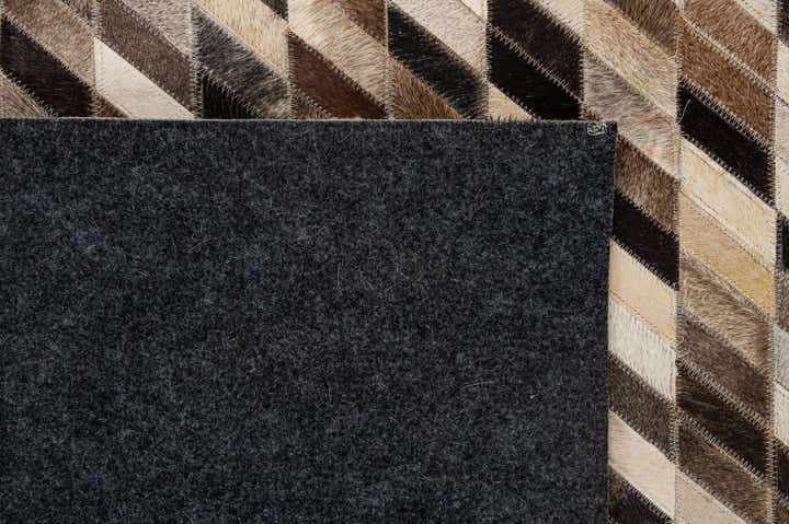 5' 1 x 7' 11 Cowhide - Patchwork Rug