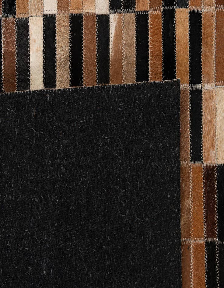Detail image of 5' 3 x 7' 11 Cowhide - Patchwork Rug