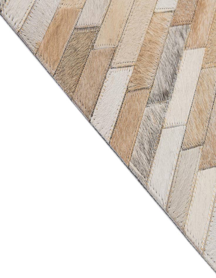 Detail image of 5' 1 x 8' 2 Cowhide - Patchwork Rug