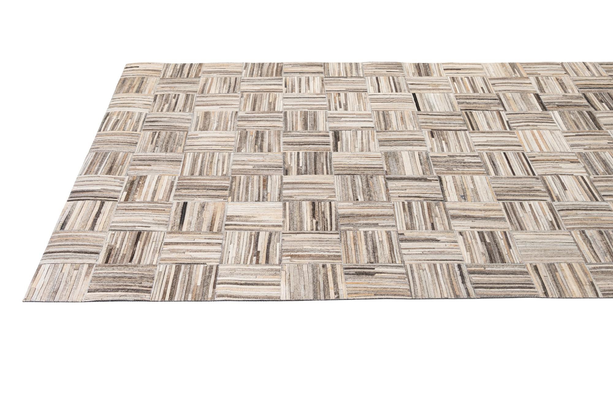 4' 11 x 7' 10 Cowhide - Patchwork Rug