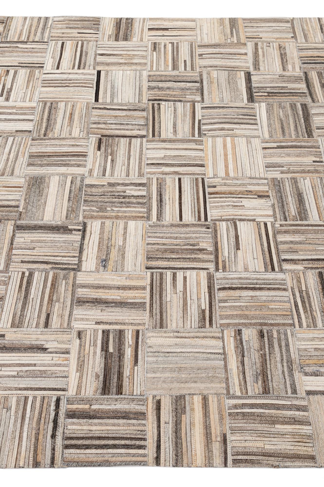 4' 11 x 7' 10 Cowhide - Patchwork Rug