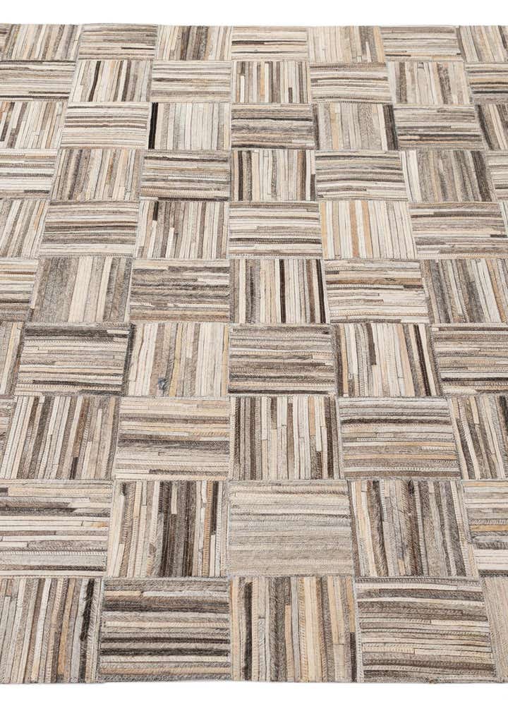 4' 11 x 7' 10 Cowhide - Patchwork Rug