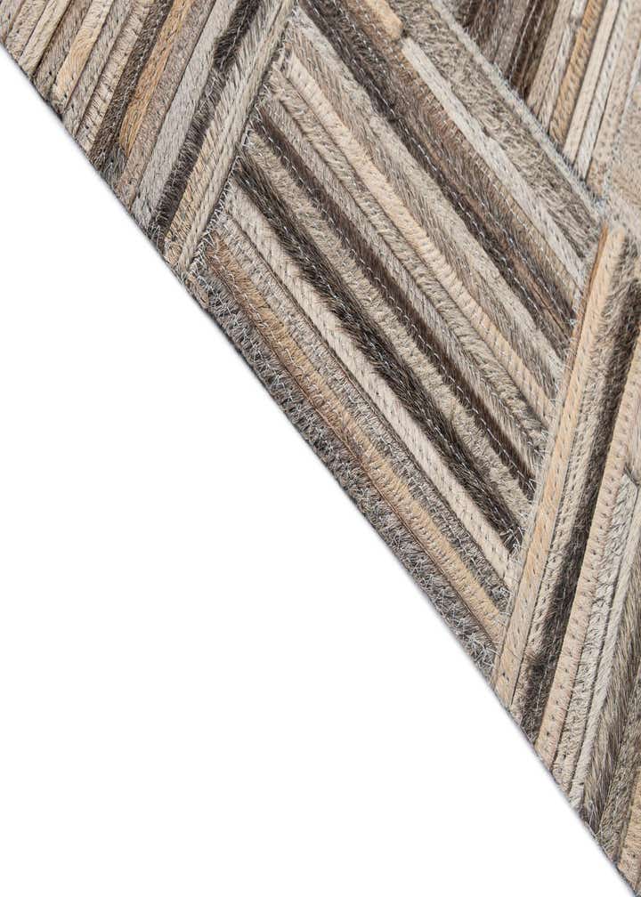 4' 11 x 7' 10 Cowhide - Patchwork Rug