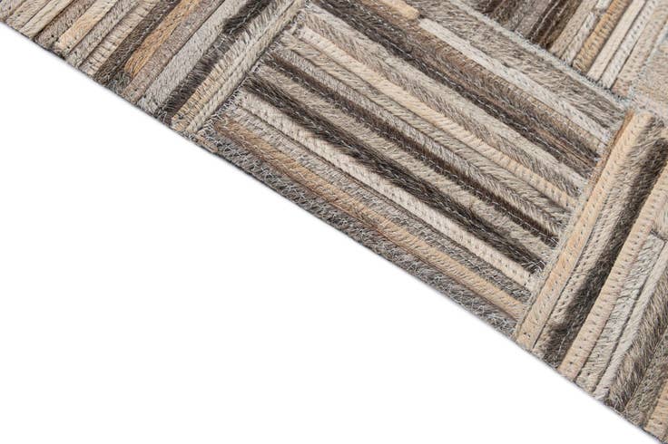 Detail image of 4' 11 x 7' 10 Cowhide - Patchwork Rug