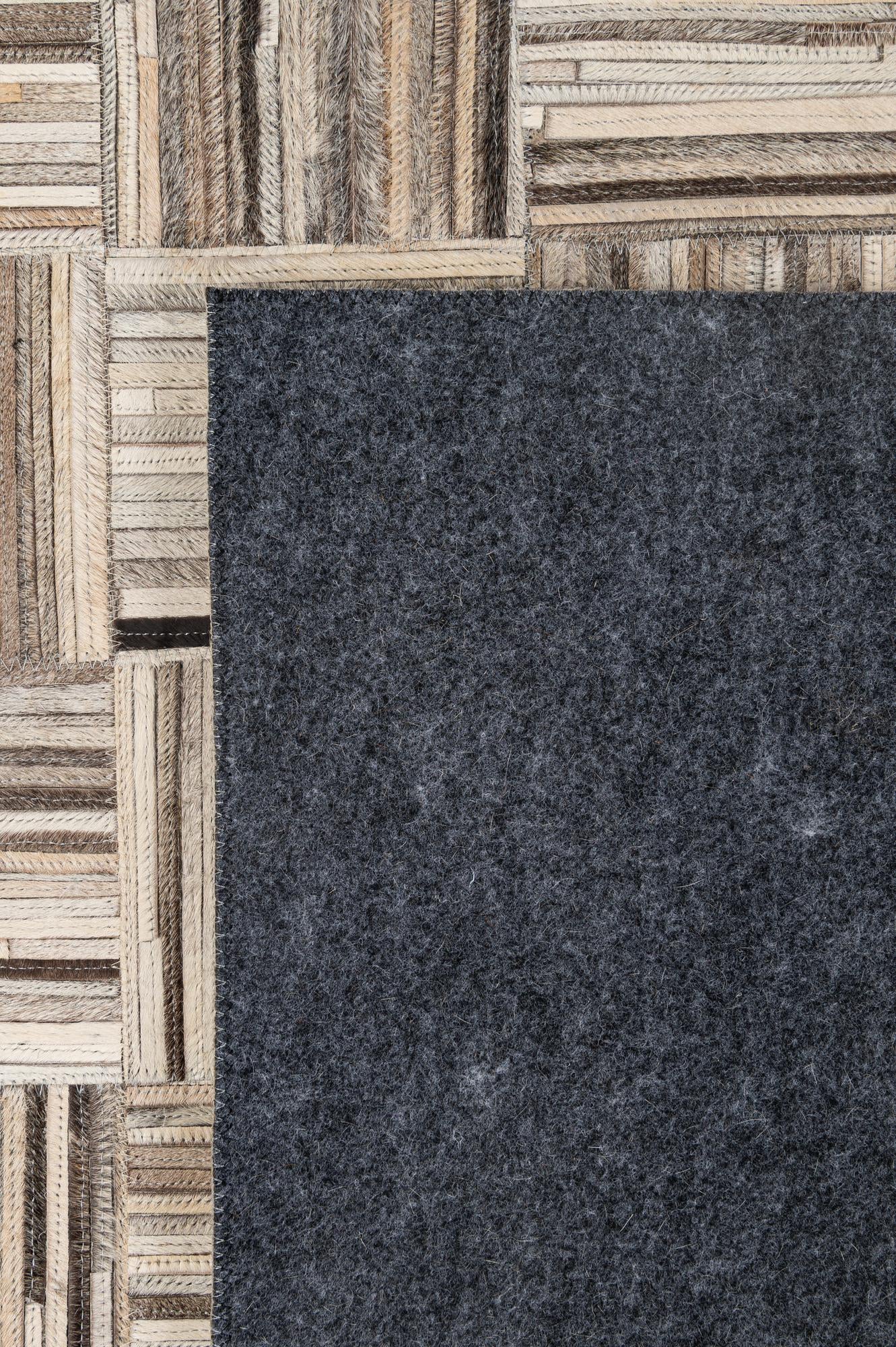 4' 11 x 7' 10 Cowhide - Patchwork Rug