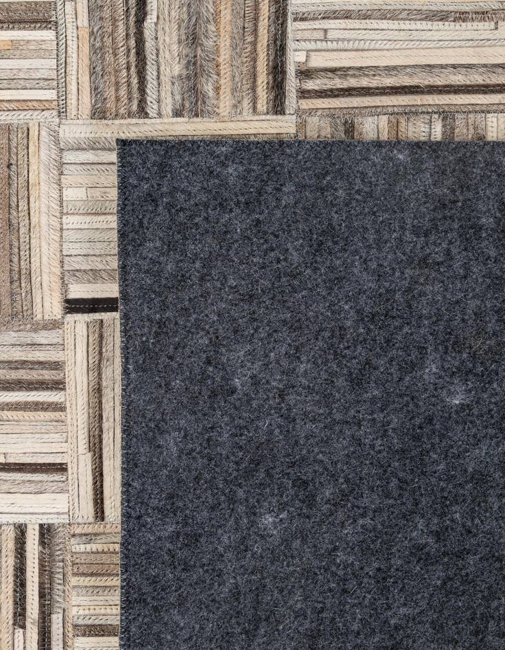 Detail image of 4' 11 x 7' 10 Cowhide - Patchwork Rug