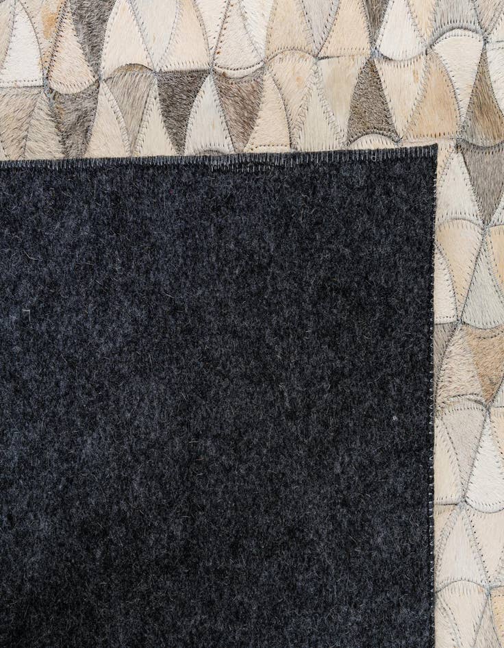 Detail image of 5' x 7' 11 Cowhide - Patchwork Rug