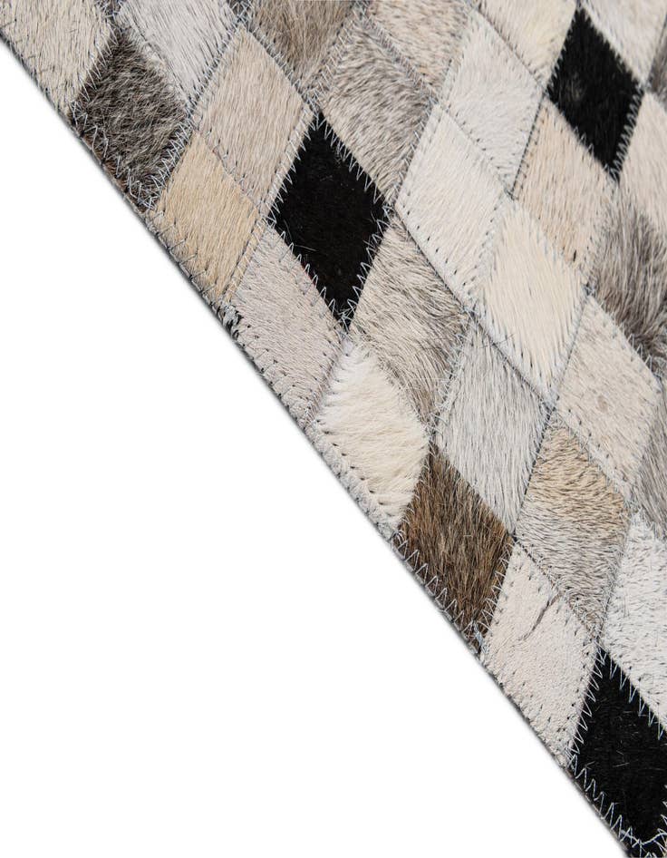 Detail image of 5' x 7' 11 Cowhide - Patchwork Rug