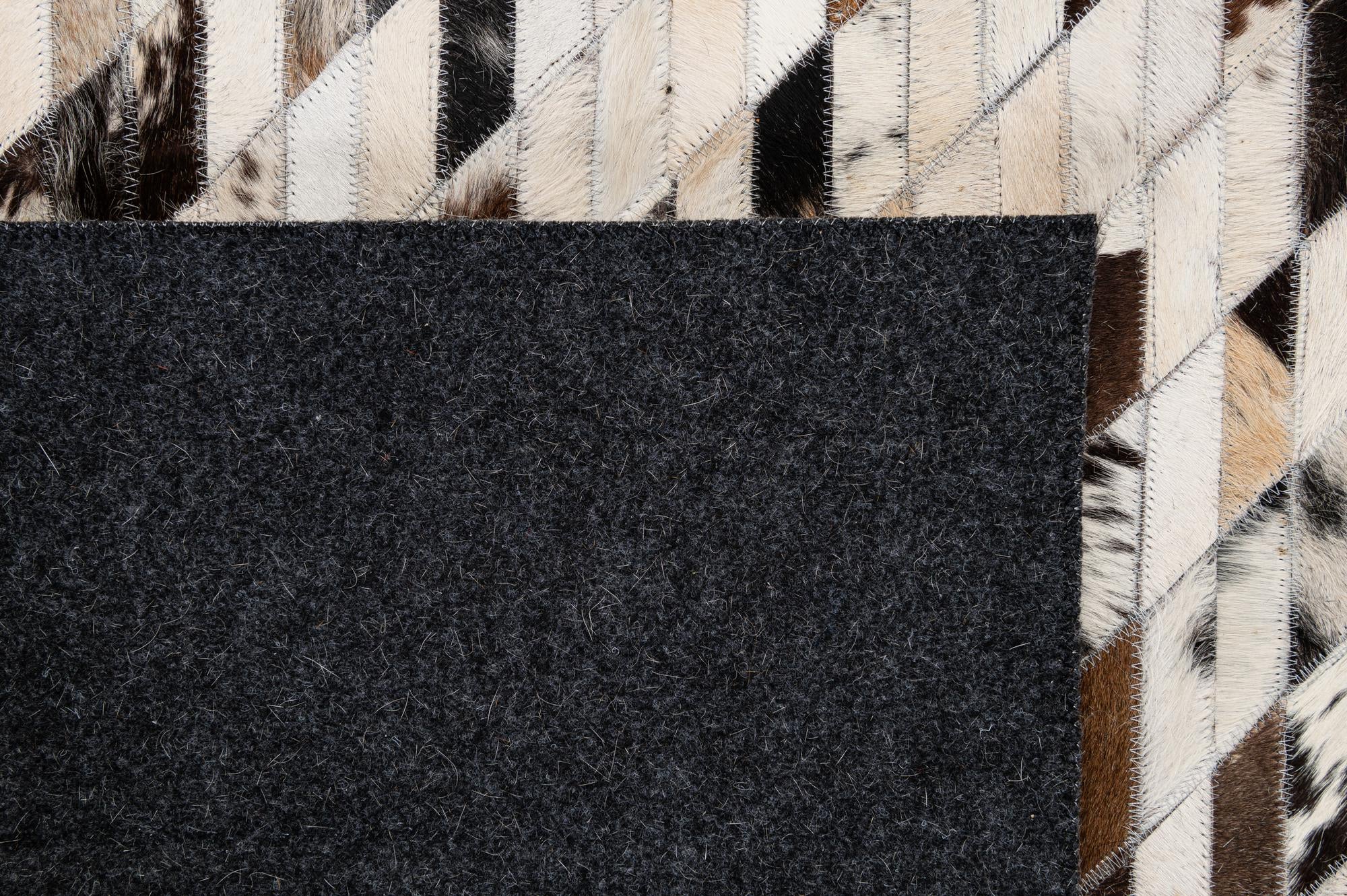 5' 1 x 7' 10 Cowhide - Patchwork Rug