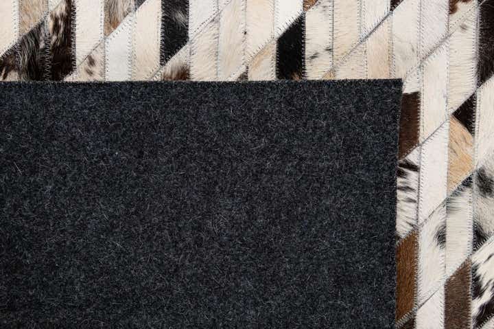 5' 1 x 7' 10 Cowhide - Patchwork Rug