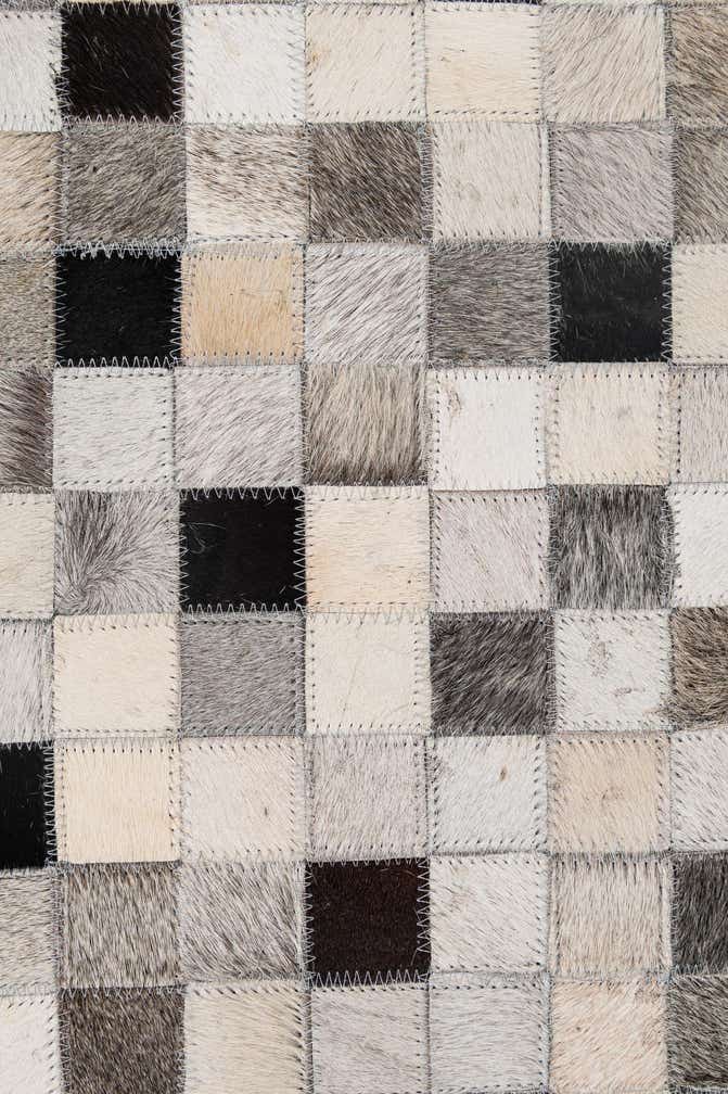 5' 2 x 8' 2 Cowhide - Patchwork Rug