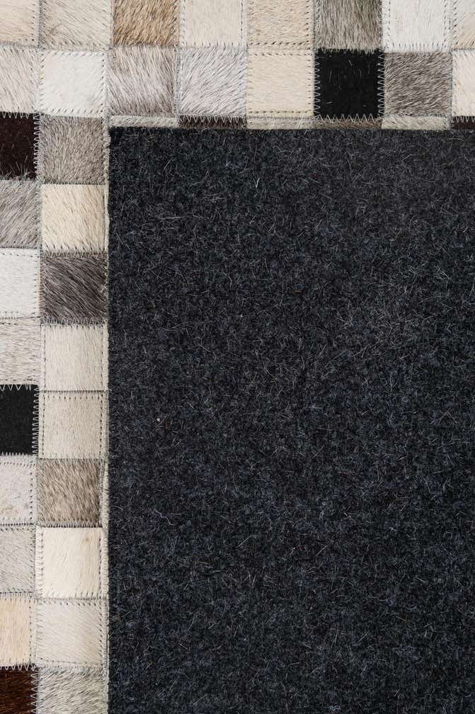 5' 2 x 8' 2 Cowhide - Patchwork Rug