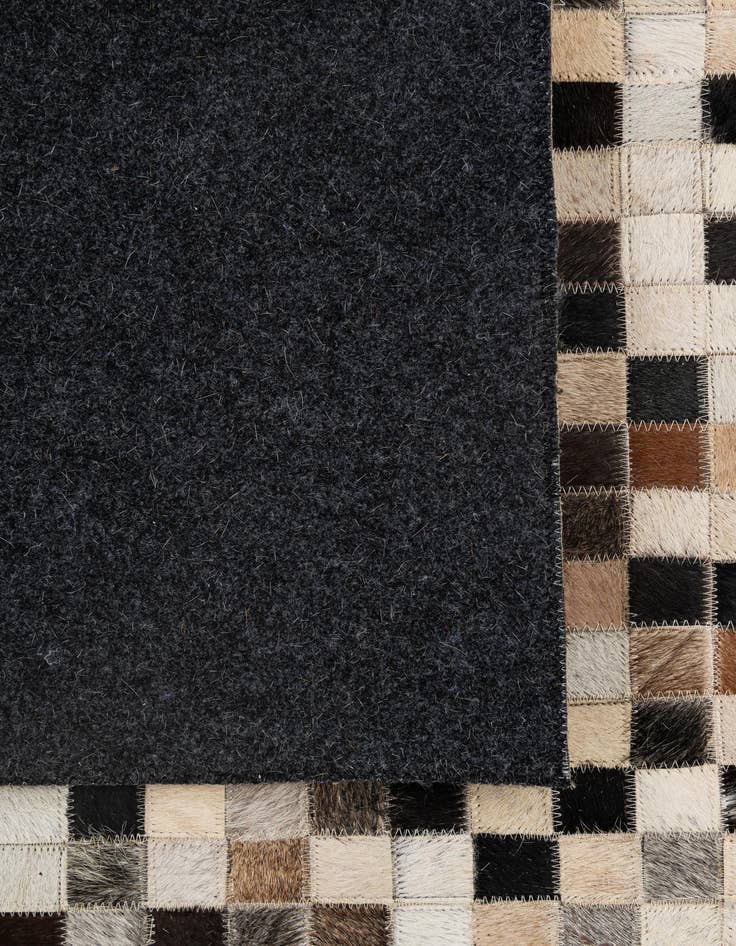 Detail image of 5' x 7' 11 Cowhide - Patchwork Rug