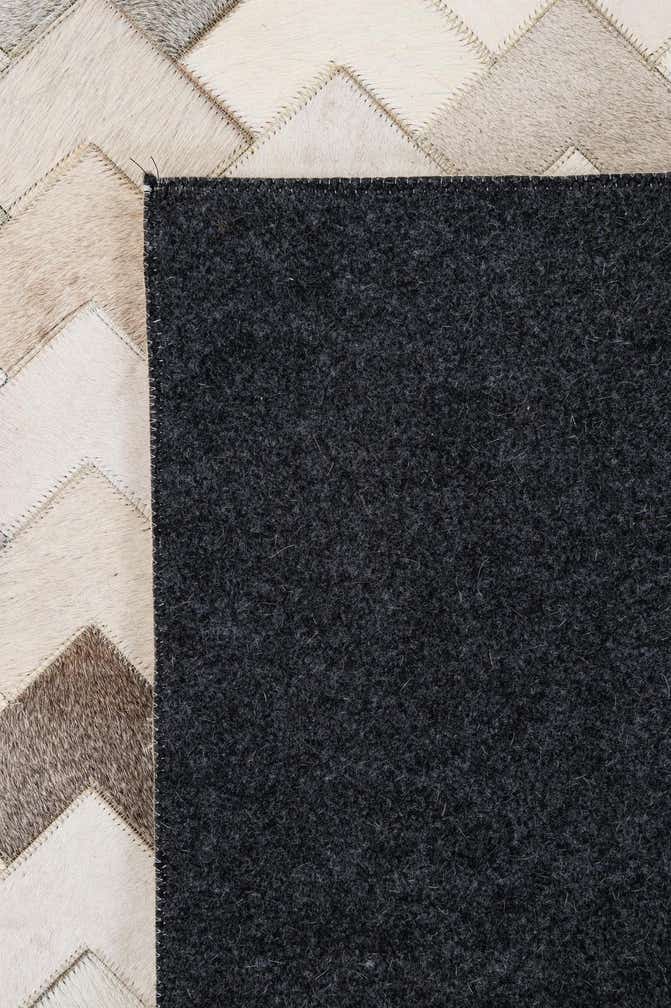 5' 3 x 7' 11 Cowhide - Patchwork Rug