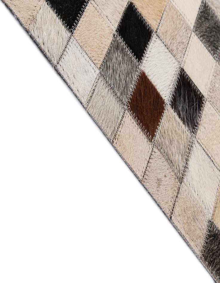 Detail image of 4' 11 x 8' 2 Cowhide - Patchwork Rug