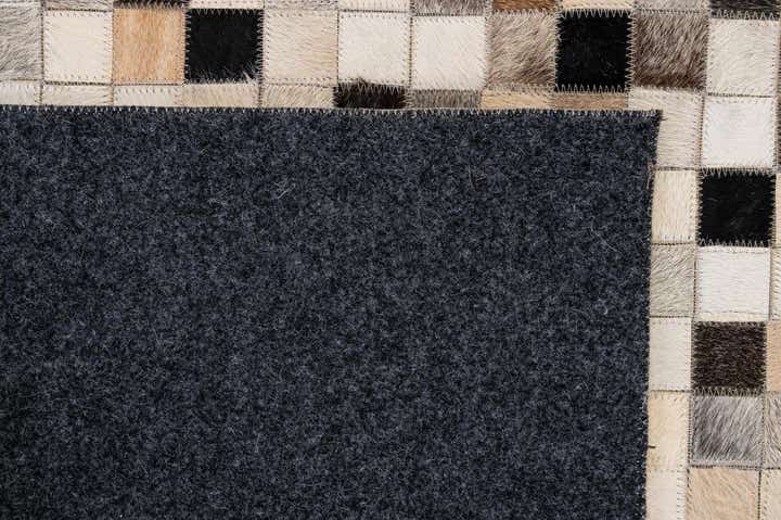 4' 11 x 8' 2 Cowhide - Patchwork Rug