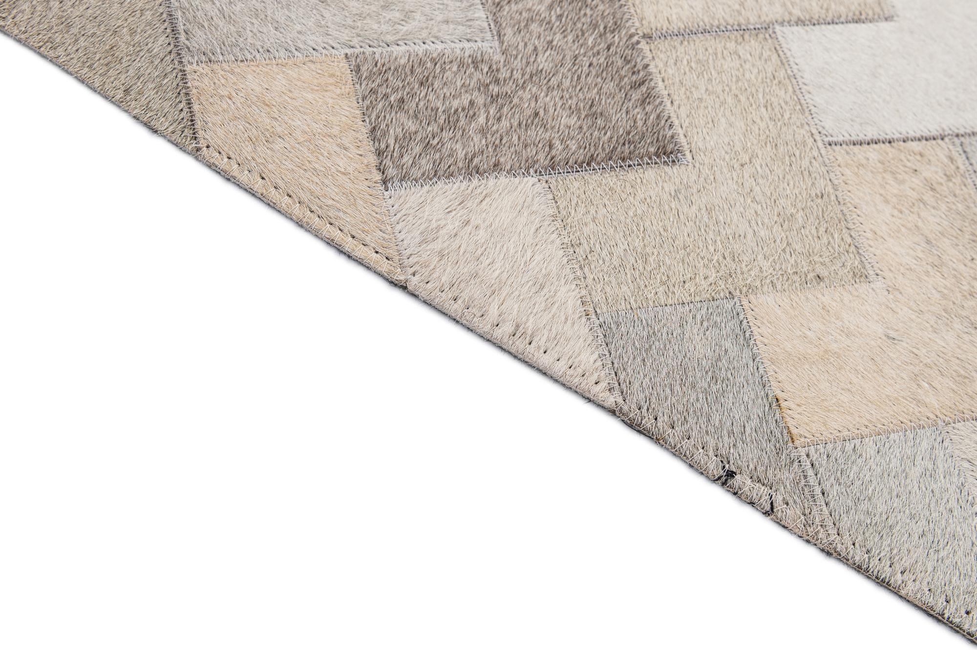 5' 3 x 8' 1 Cowhide - Patchwork Rug