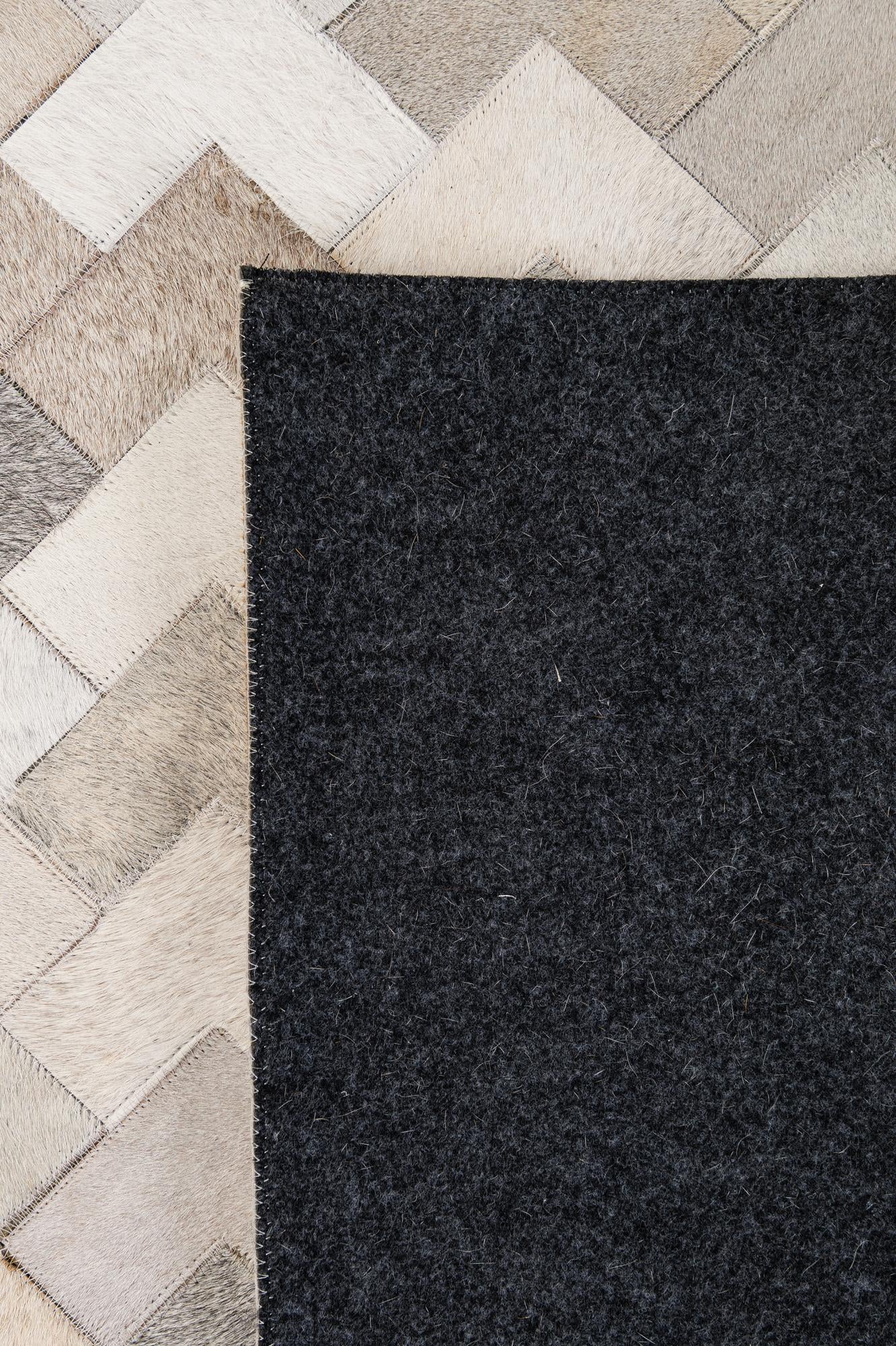 5' 3 x 8' 1 Cowhide - Patchwork Rug