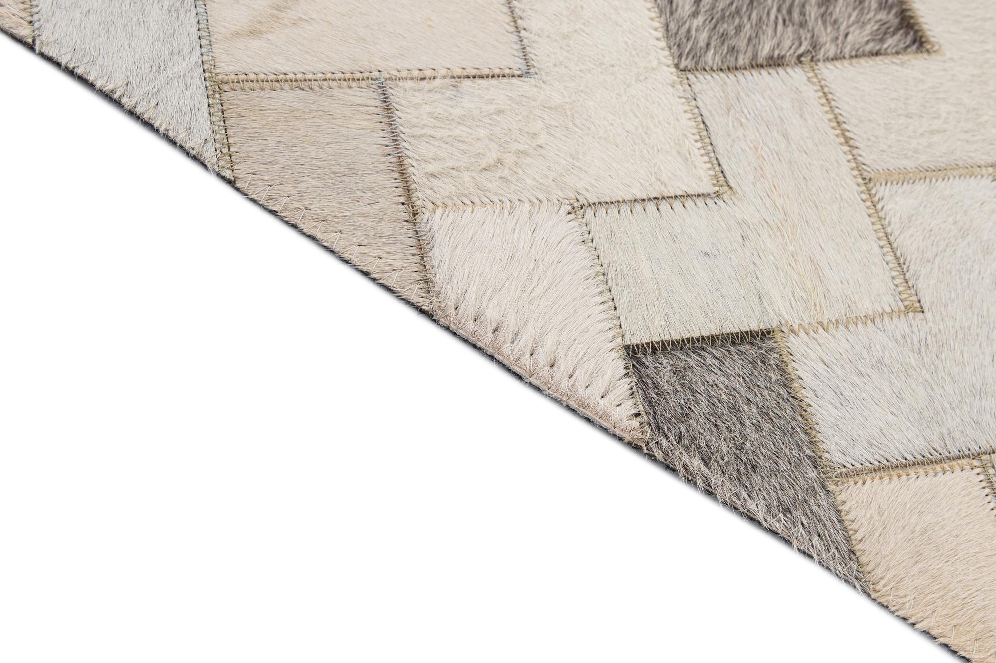 5' 3 x 7' 11 Cowhide - Patchwork Rug