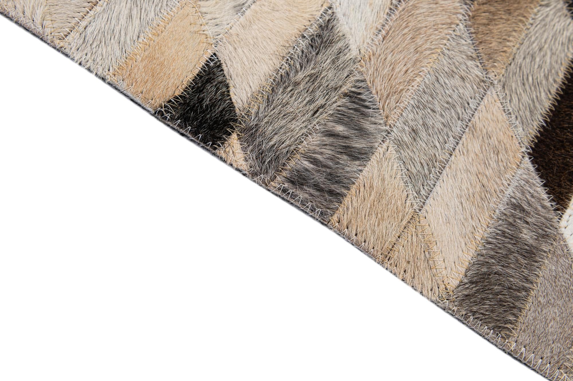 5' 1 x 7' 10 Cowhide - Patchwork Rug