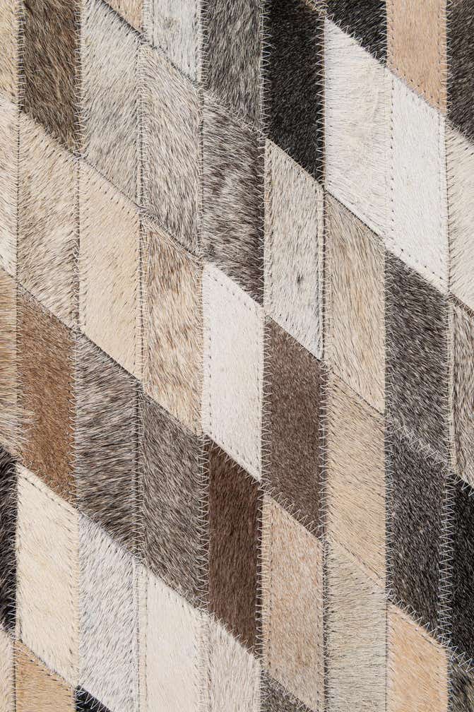 5' 1 x 7' 10 Cowhide - Patchwork Rug