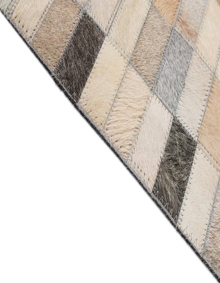 Detail image of 5' 1 x 8' 1 Cowhide - Patchwork Rug