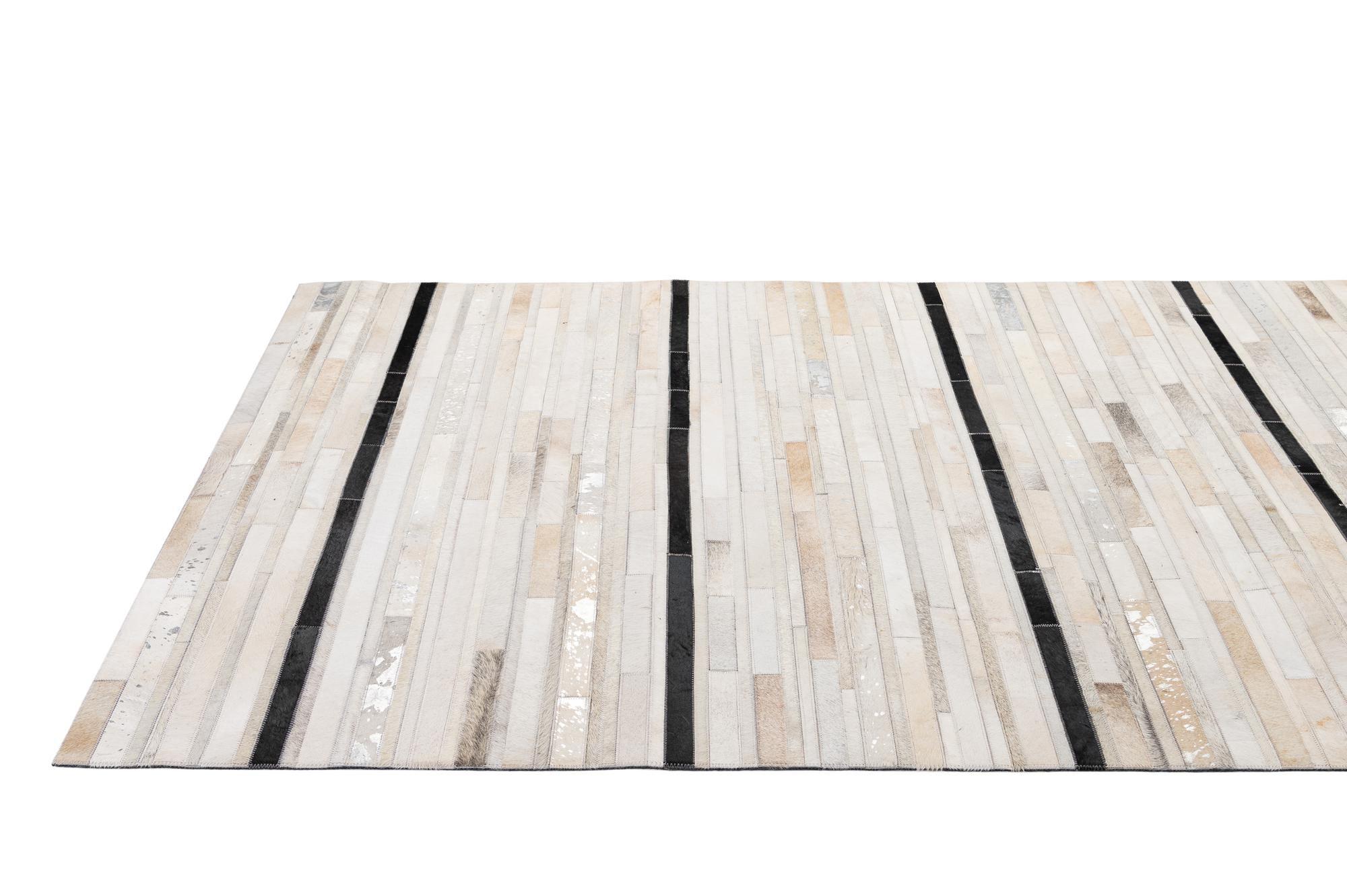 5' 2 x 8' 1 Cowhide - Patchwork Rug
