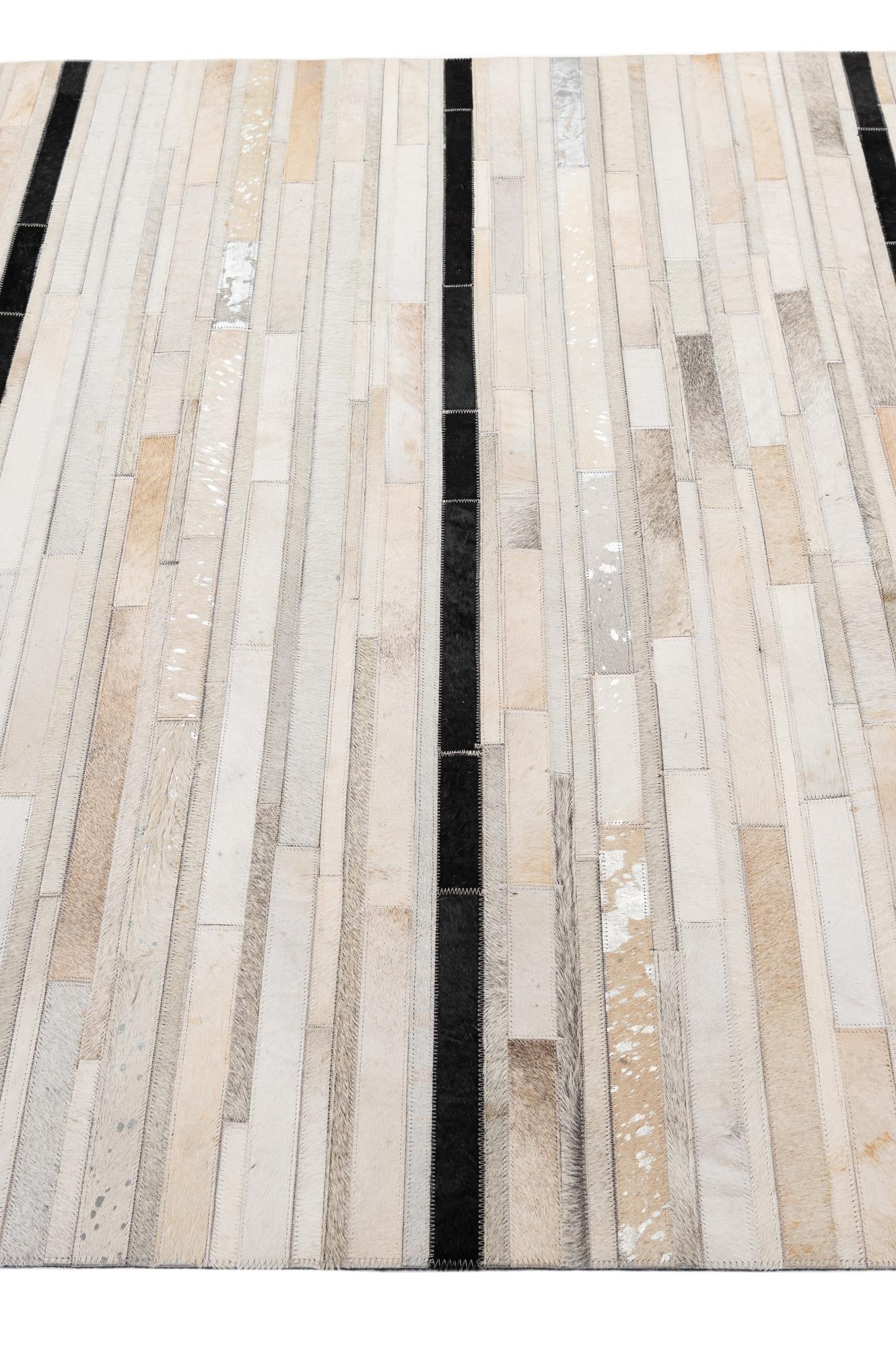 5' 2 x 8' 1 Cowhide - Patchwork Rug