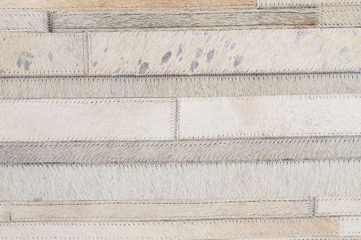 5' 2 x 8' 1 Cowhide - Patchwork Rug