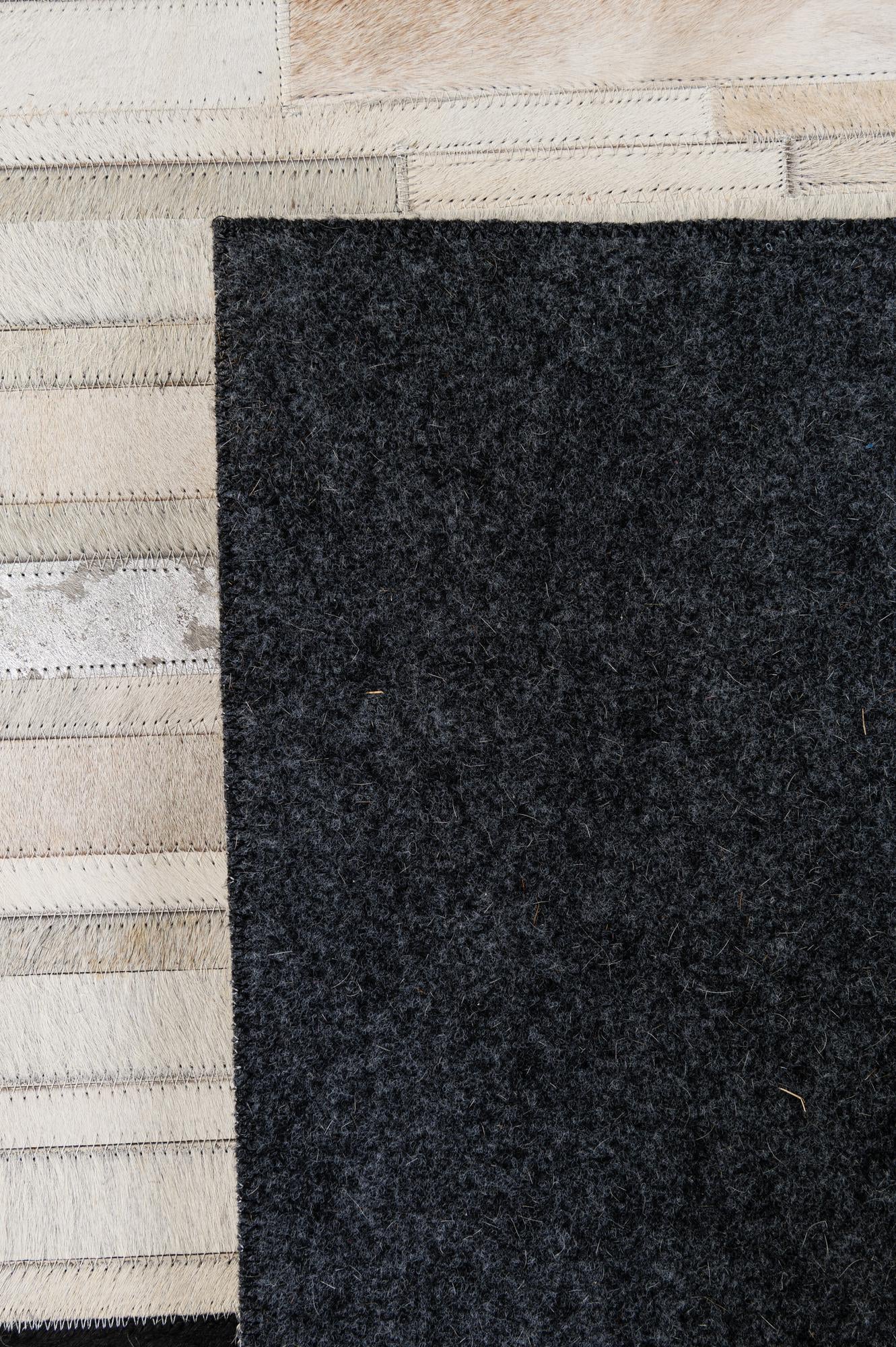 5' 2 x 8' 1 Cowhide - Patchwork Rug
