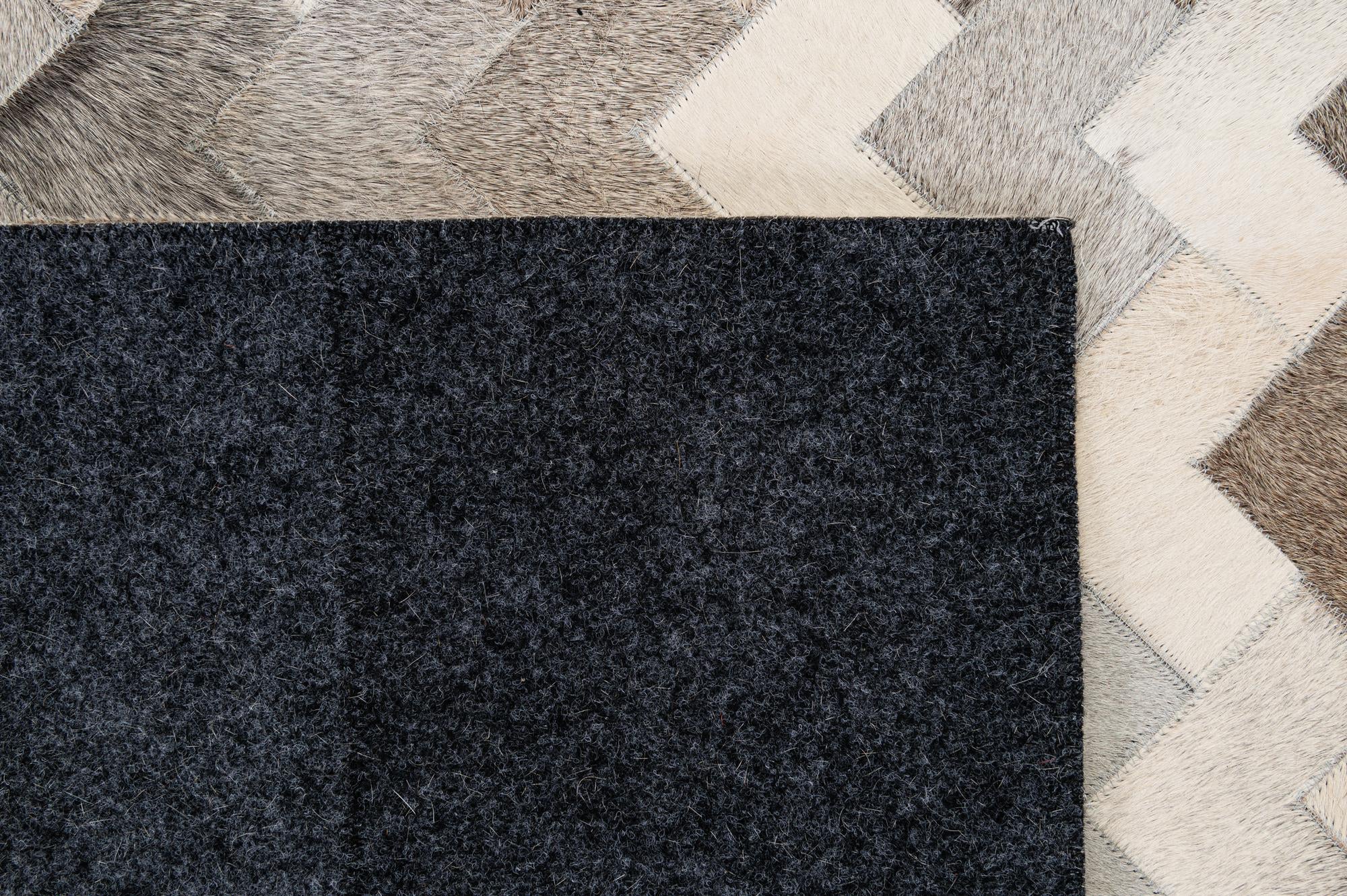 5' 7 x 7' 10 Cowhide - Patchwork Rug