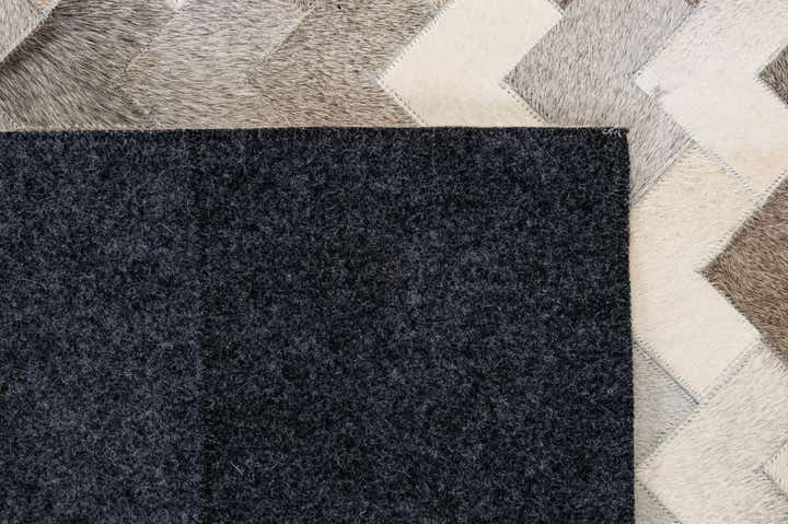 5' 7 x 7' 10 Cowhide - Patchwork Rug