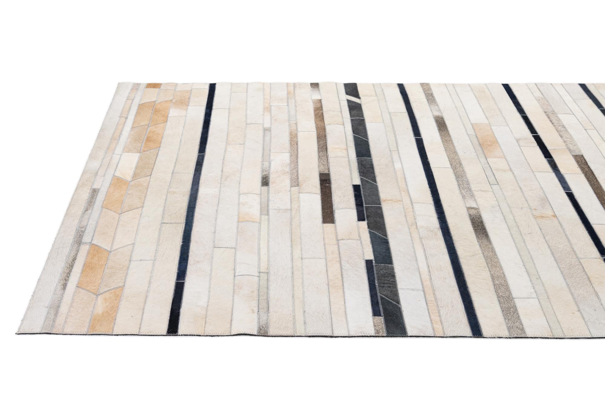 4' 11 x 7' 8 Cowhide - Patchwork Rug