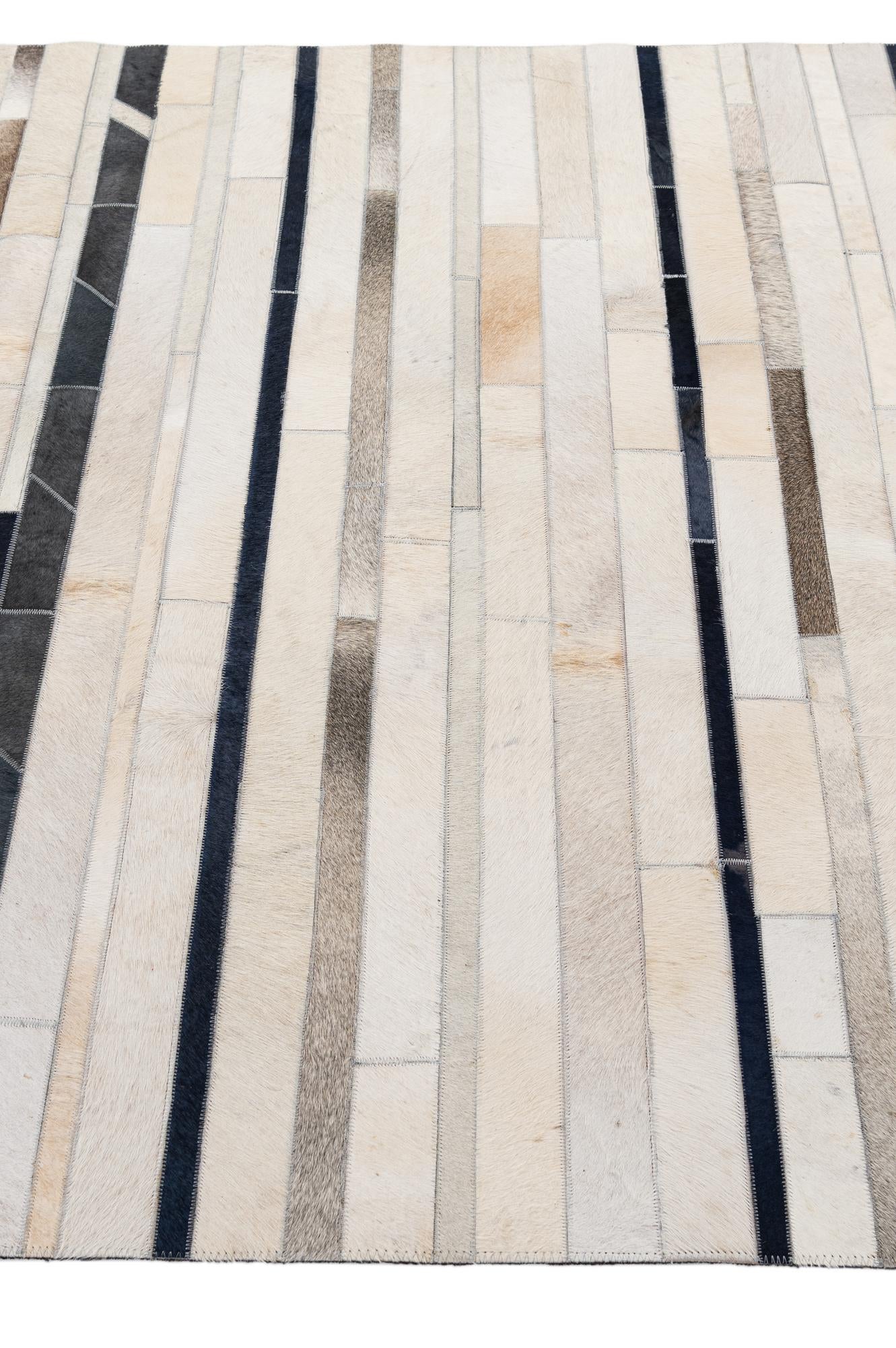 4' 11 x 7' 8 Cowhide - Patchwork Rug