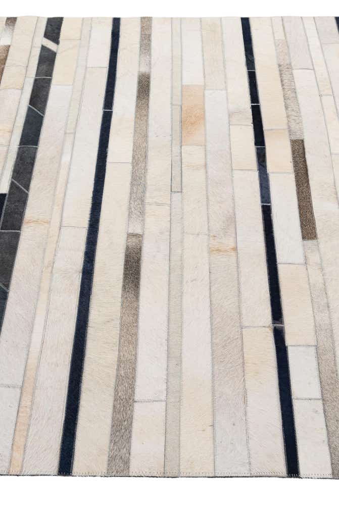 4' 11 x 7' 8 Cowhide - Patchwork Rug