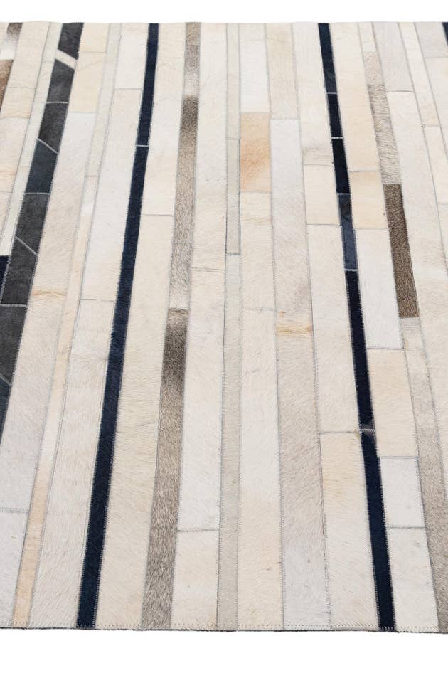 Detail image of 4' 11 x 7' 8 Cowhide - Patchwork Rug