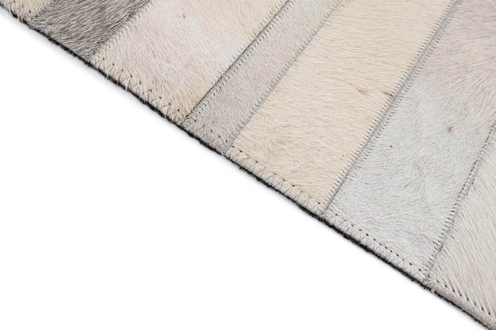 4' 11 x 7' 8 Cowhide - Patchwork Rug