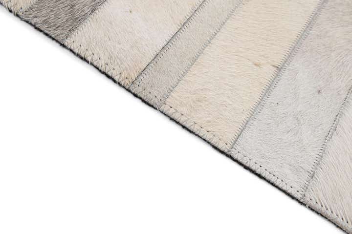 4' 11 x 7' 8 Cowhide - Patchwork Rug