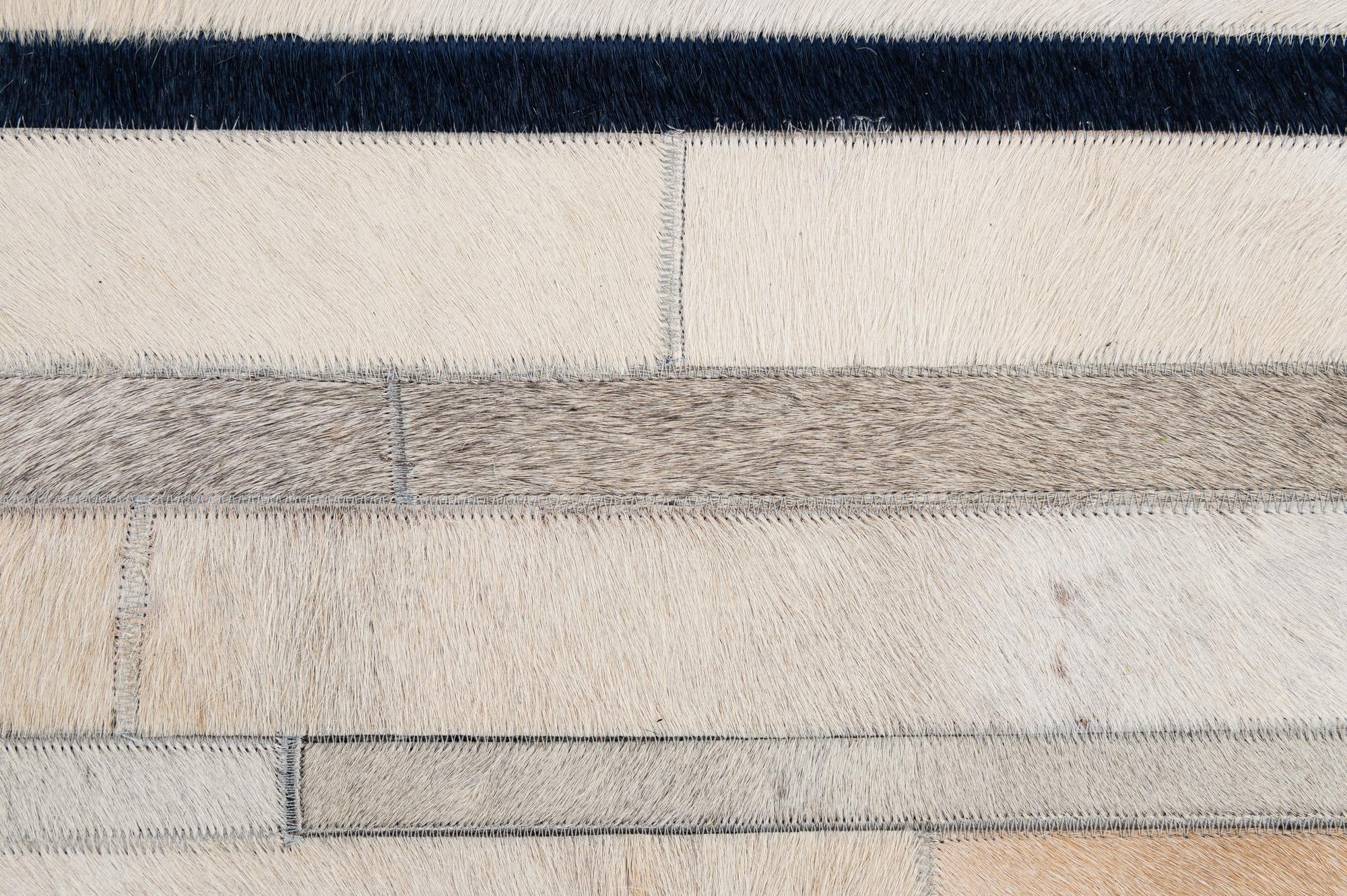 4' 11 x 7' 8 Cowhide - Patchwork Rug