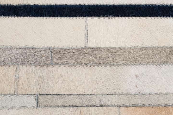 4' 11 x 7' 8 Cowhide - Patchwork Rug