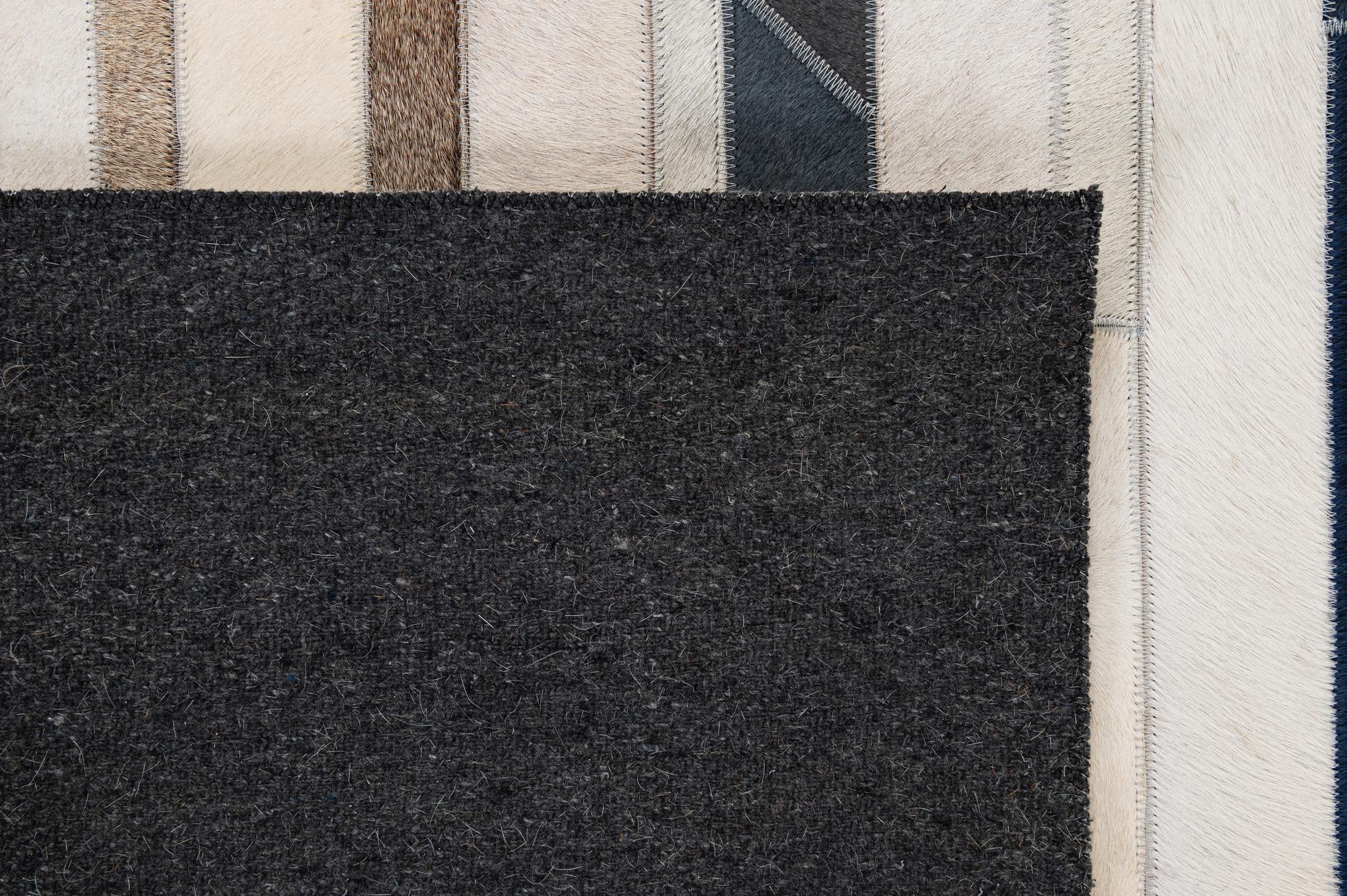 4' 11 x 7' 8 Cowhide - Patchwork Rug