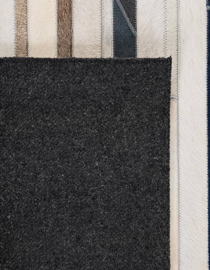 Detail image of 4' 11 x 7' 8 Cowhide - Patchwork Rug